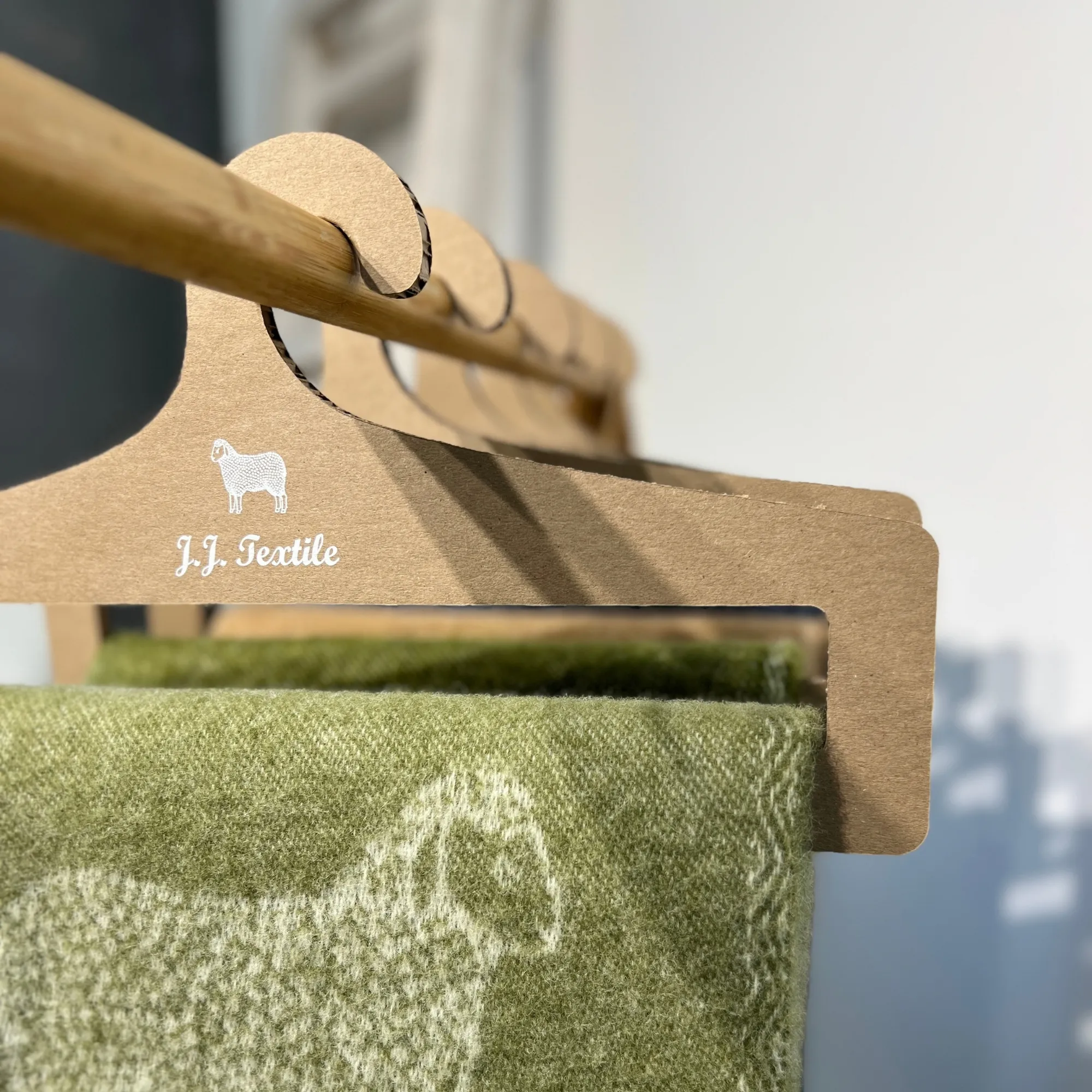 J.j. Textile Cardboard Hangers Close 1 J.j. Textile Cardboard Hangers Close 1